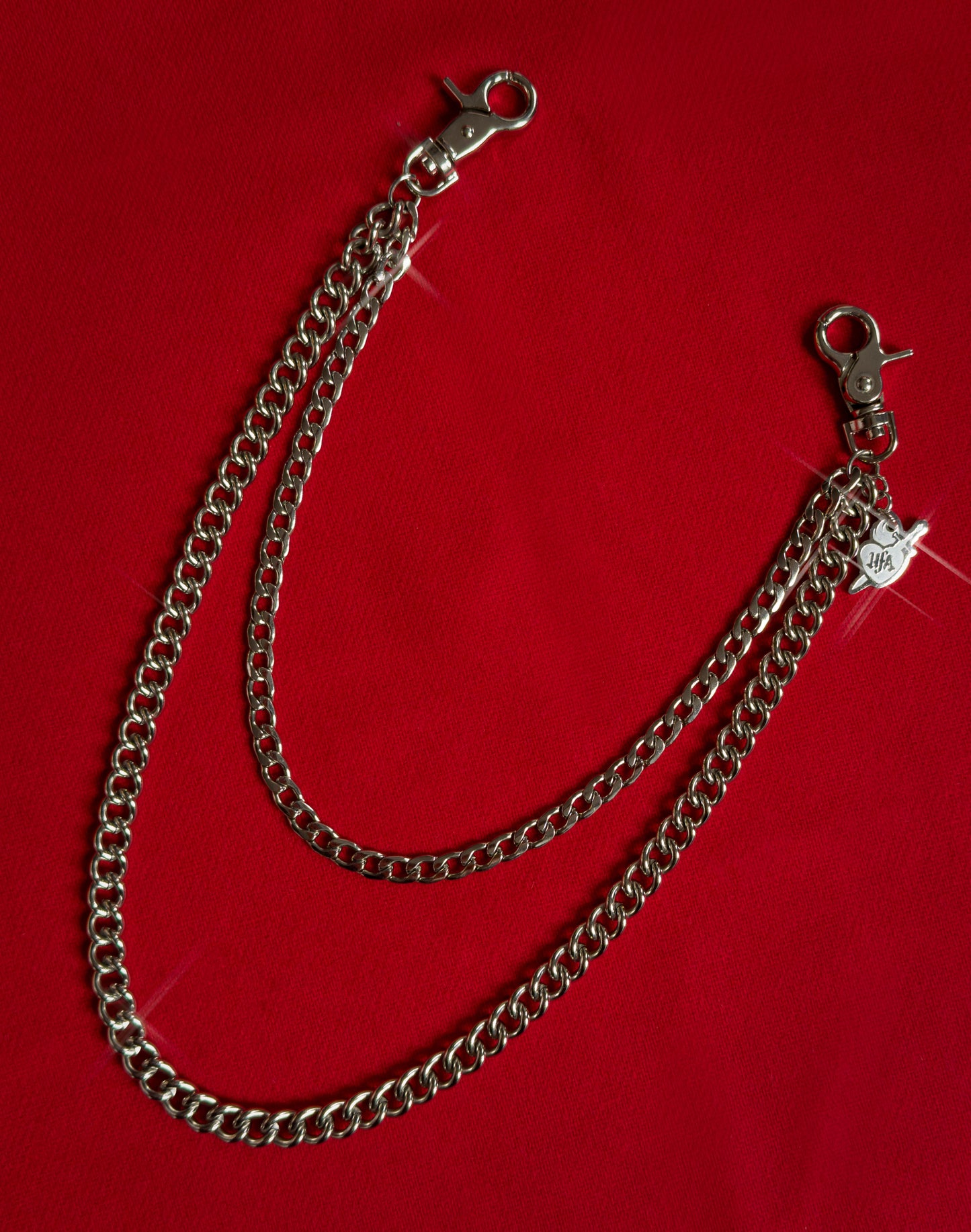Double layer stainless steel silver pocket chain with lobster clasps, an 8 inch extender chain, and custom laser-cut HFA sacred heart charm.