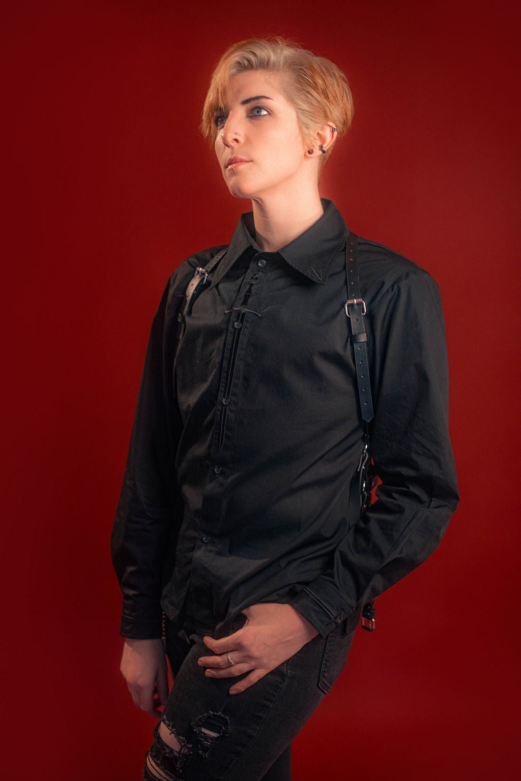 black cotton twill button up with a large black sword embroidered down the placket, and smaller swords embroidered on the collar points and cuffs.