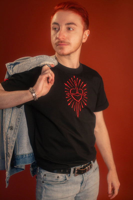 Black 100% cotton tshirt with embroidered red sword and heart design on chest, cuffed sleeves with a hand-tacked red X on one, printed collar information, and Saints & Sonnets heart and sword logo on a red hem tag and printed in red on the back collar.