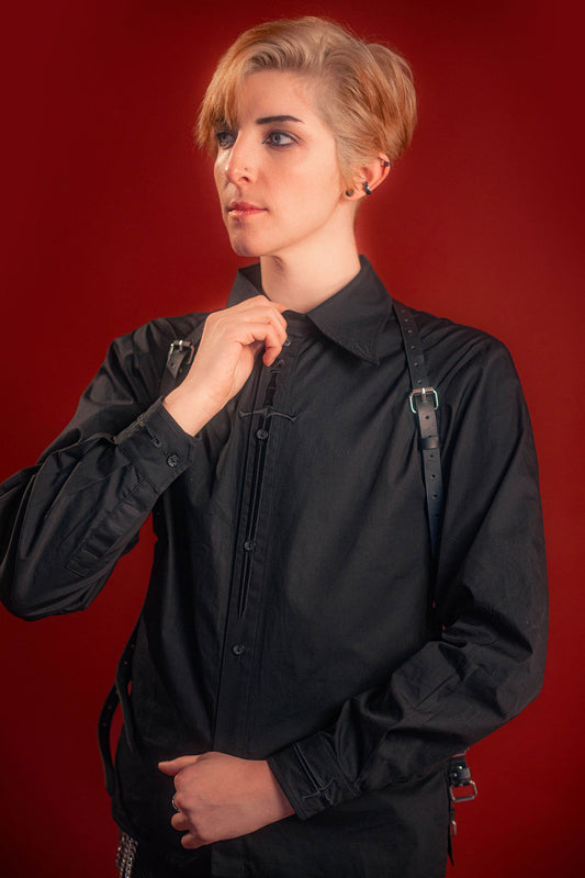 black cotton twill button up with a large black sword embroidered down the placket, and smaller swords embroidered on the collar points and cuffs.
